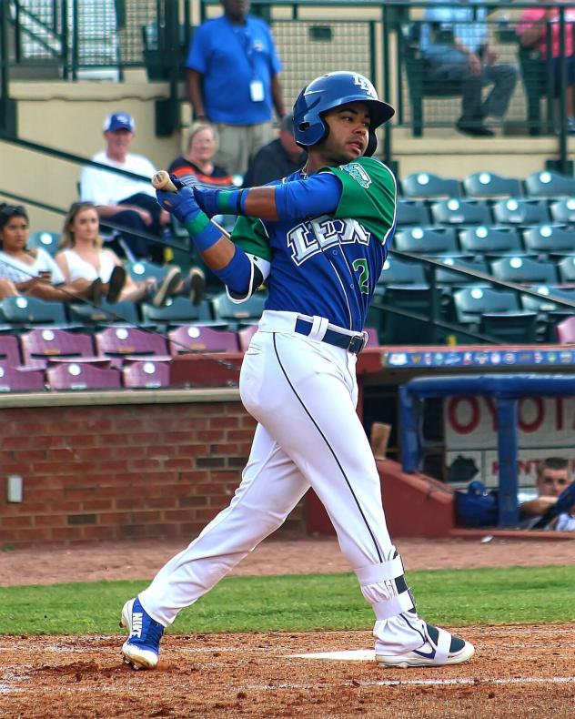 Ricky Aracena of the Lexington Legends takes a swing