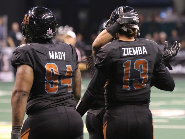 Arizona Rattlers quarterback Jeff Ziemba receives congratulations from a teammate