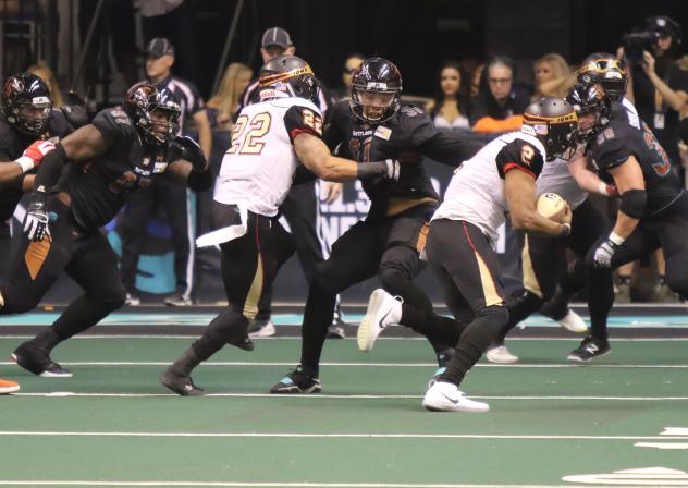 The Arizona Rattlers defense zeros in on an Iowa Barnstormers ballcarrier