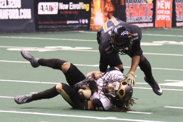 Dezmon Epps of the Arizona Rattlers takes down a member of the Iowa Barnstormers