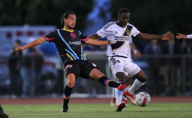 Las Vegas Lights FC's Daigo Kobayashi battles for possession during the club's 7-2 defeat on the road at LA Galaxy II