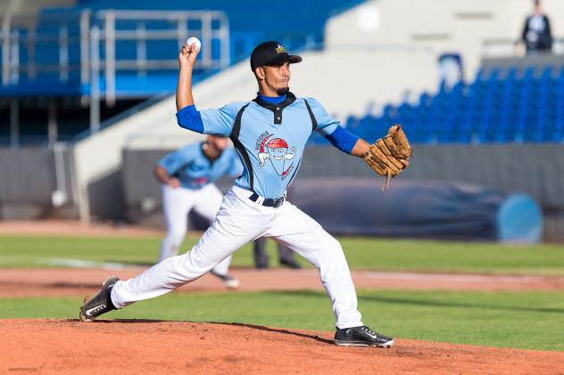 Victoria HarbourCats pitcher Adriel Queseda Pena delivers the first pitch