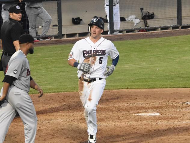 Mike Fransoso scores for the Somerset Patriots