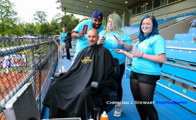 Victoria HarbourCats GM Brad Norris-Jones gets a haircut at the stadium