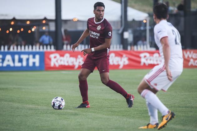 Sacramento Republic FC looks for a passing lane against Orange County SC