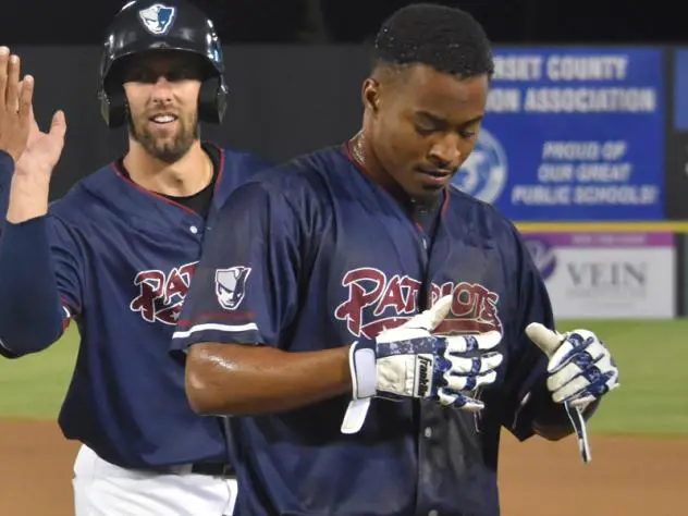 Justin Trapp and the Somerset Patriots celebrate a 12-inning win
