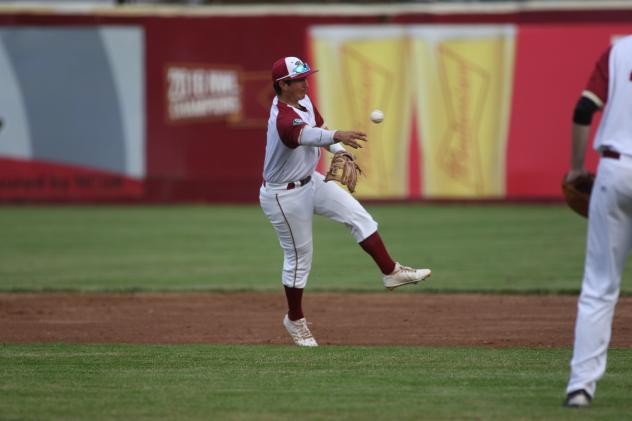 Wisconsin Rapids Rafters turn a play in the field