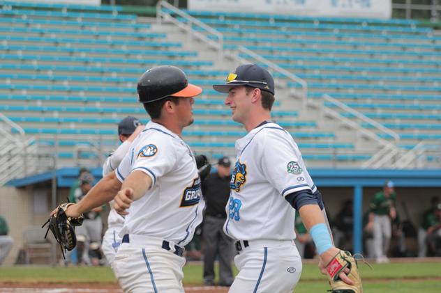 Kalamazoo Growlers celebrate with a chest bump