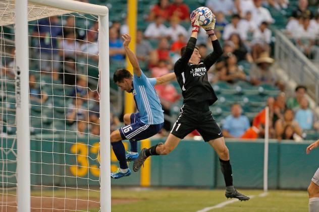 Sacramento Republic FC goalkeeper Josh Cohen makes a save vs. Fresno FC