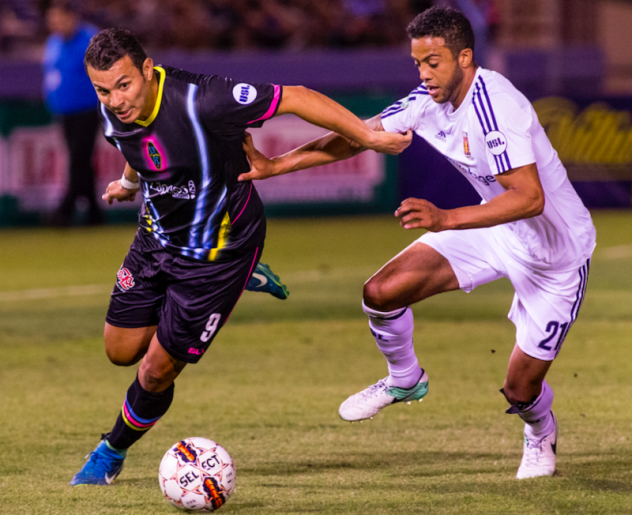 Las Vegas Lights FC midfielder Carlos Alvarez eyes the ball