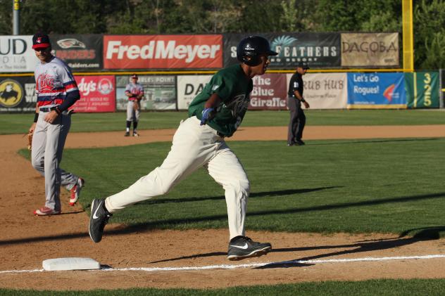 LF Josh McIntyre of the Medford Rogues rounds third after a monster first inning home run