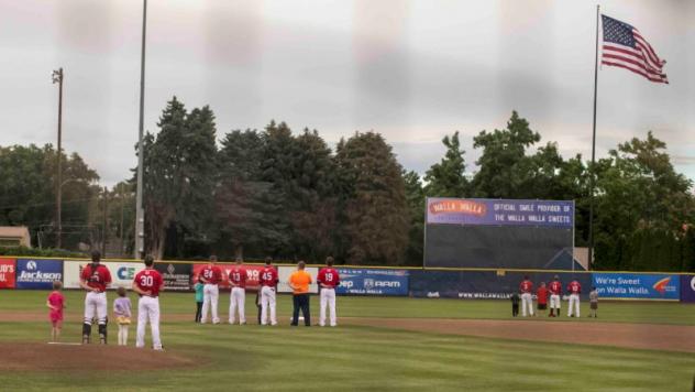 Walla Walla Sweets stand for the National Anthem