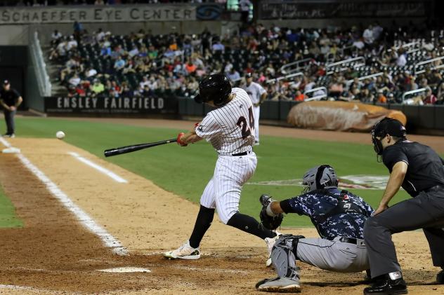 Zack Collins of the Birmingham Barons with a big swing