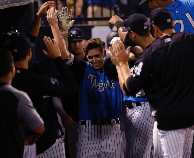 Tampa Tarpons congratulate Ben Ruta on his home run