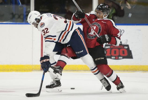 Vancouver Giants defenceman Alex Kannok Leipert battles for the puck