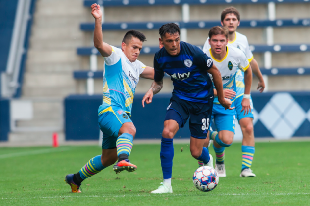 Las Vegas Lights FC's Marcelo Alatorre slides in to break up possession vs. the Swope Park Rangers