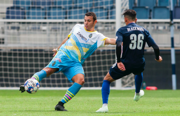Las Vegas Lights FC forward Sammy Ochoa strikes the ball