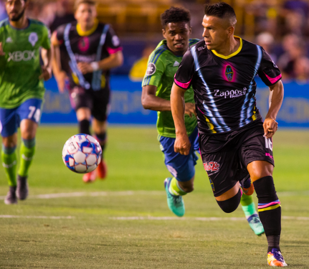 Las Vegas Lights FC defender Marcelo Alatorre works for a clearance