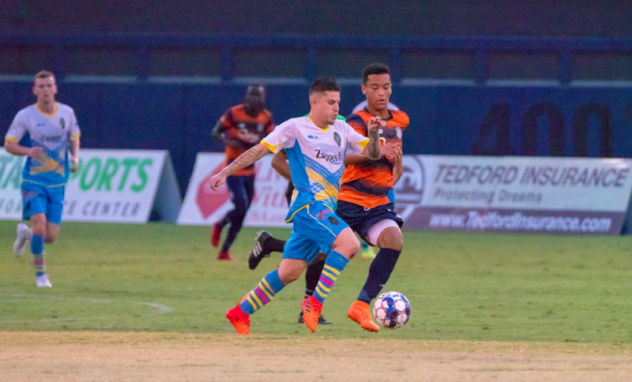 Las Vegas Lights FC's Raul Mendiola moves upfield with the ball