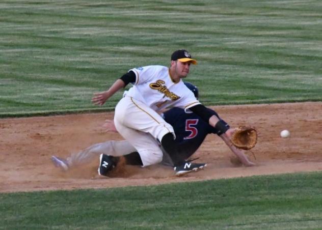 A close play at second betweent the Willmar Stingers and Waterloo Bucks