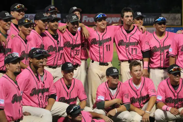 Medford Rogues team photo after the game on Paint the Park Pink Night