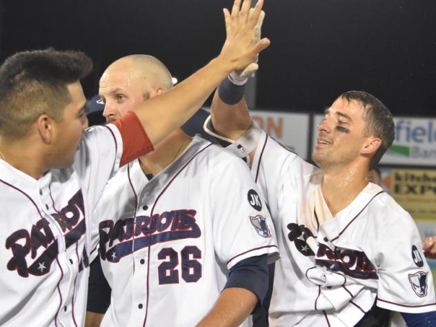 Mike Fransoso of the Somerset Patriots receives congratulations after walk-off hit