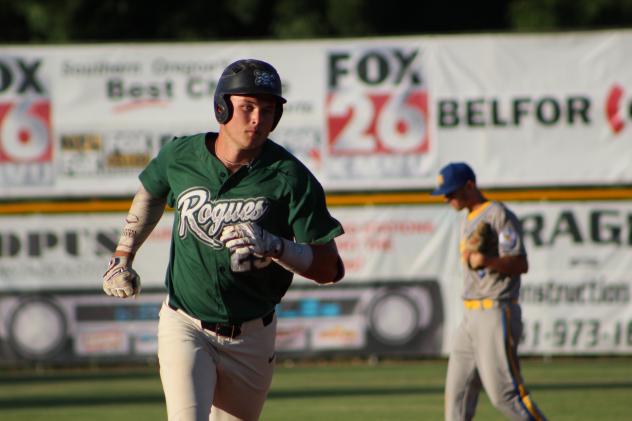 Daniel Nist of the Medford Rogues rounds the bases after a two-run bomb