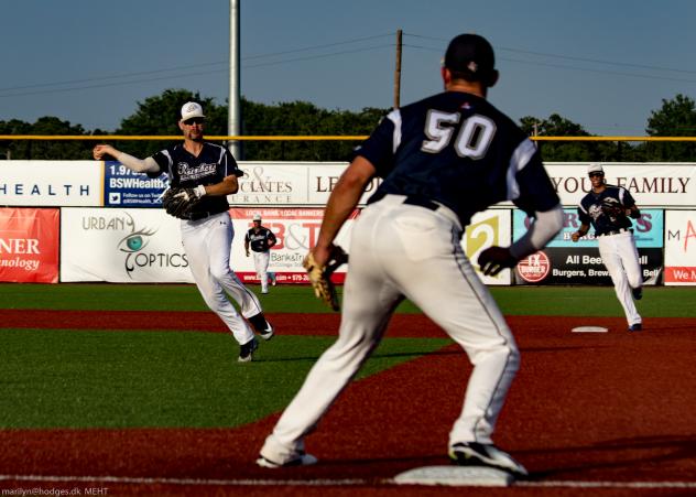 Dylan Bonhert of the Brazos Valley Bombers awaits a throw from the pitcher