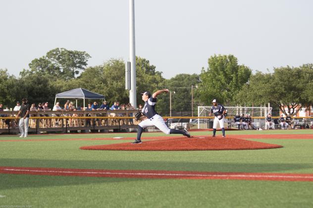 Brazos Valley Bombers deliver a pitch