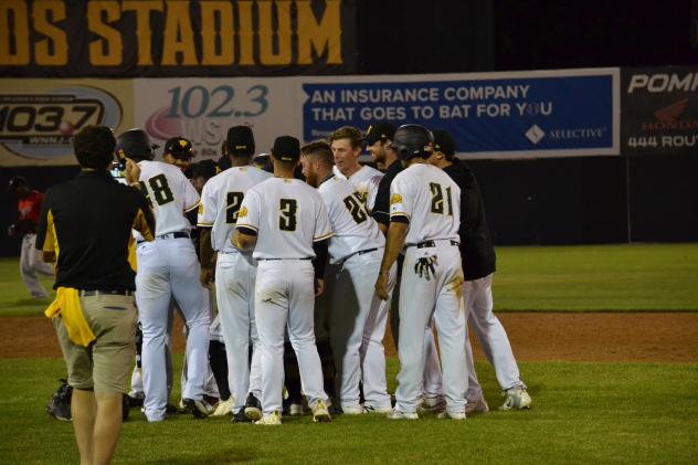 Sussex County Miners huddle after walk-off win