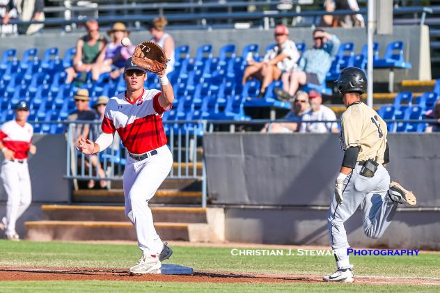 Victoria HarbourCats first baseman Cade Brown awaits a throw