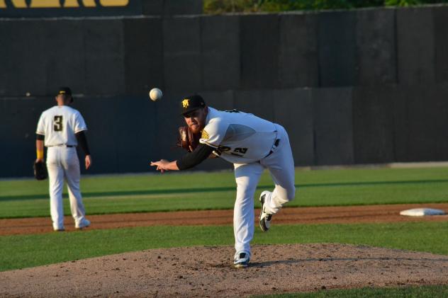 Sussex County Miners pitcher David Rollins delivers a warmup toss