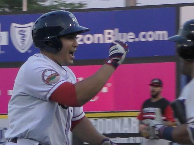 Ramon Flores of the Somerset Patriots reacts after his home run