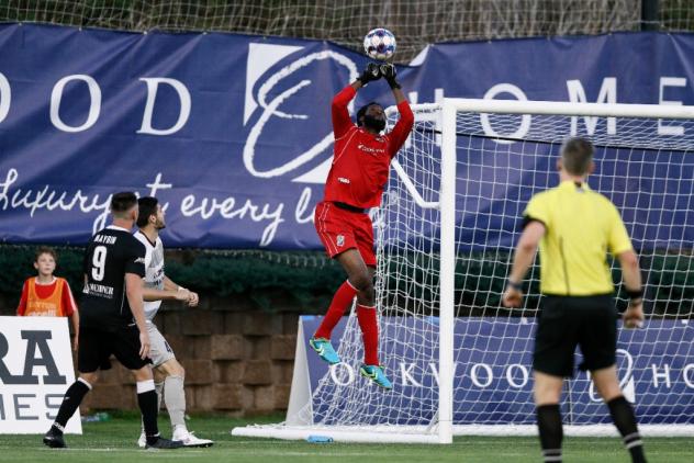 Colorado Springs Switchbacks goalkeeper Steward Ceus makes a save vs. Sacramento Republic FC