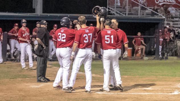 Walla Walla Sweets celebrate a homer