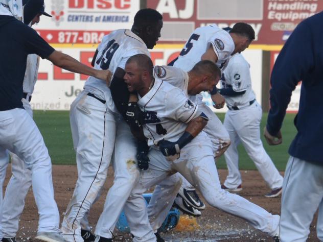 Yovan Gonzalez and the Somerset Patriots celebrate a walk-off win