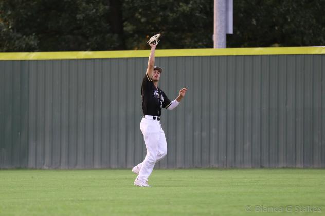 Texarkana Twins make a catch in the outfield