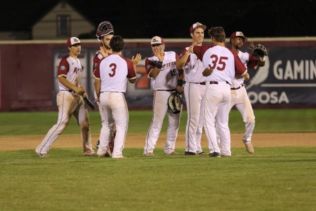 Wisconsin Rapids Rafters celebrate on the mound