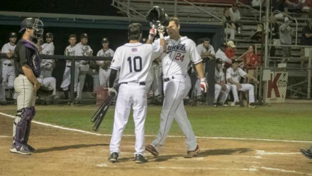 Walla Walla Sweets exchange congratulations at home plate
