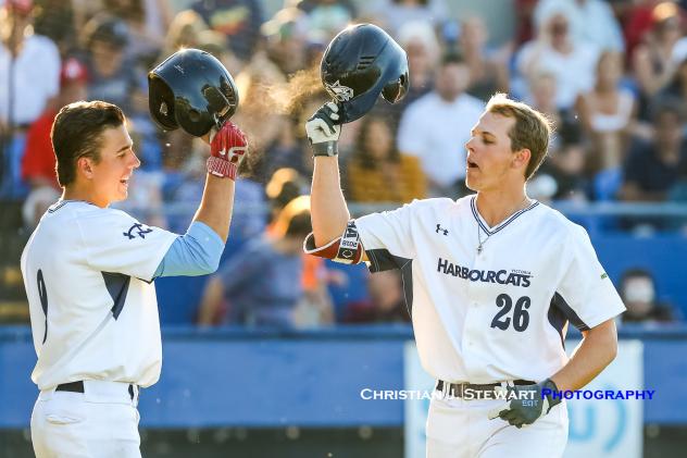 Hunter Vansau (right) is congratulated by Victoria HarbourCats teammate Ryan Ober