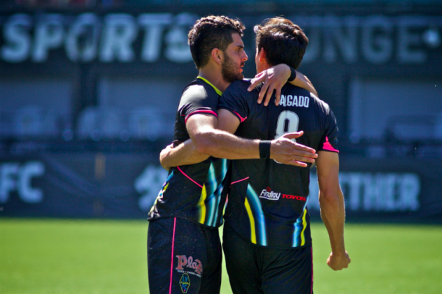 Las Vegas Lights FC's Marco Cesar Jaime Jr. (left) and Omar Salgado celebrate a goal