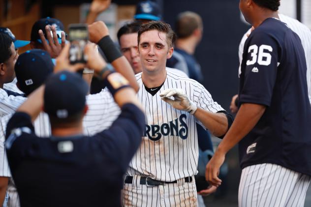 Tampa Tarpons dugout congratulates Ben Ruta