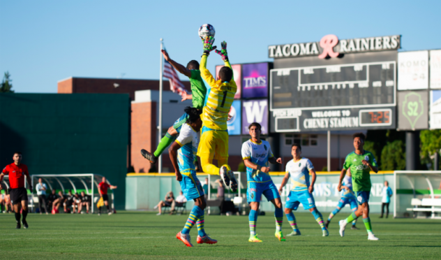 Las Vegas Lights FC goalkeeper Ricardo Ferrino goes high to stop a scoring chance