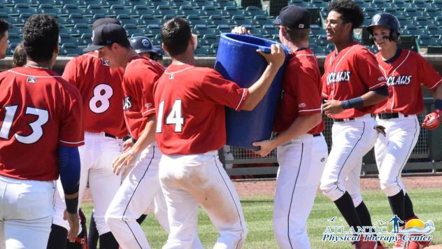 Lakewood BlueClaws celebrate a walk-off homer