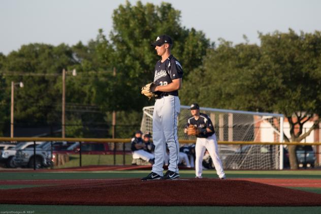 Brazos Valley Bombers prepare to deliver a pitch