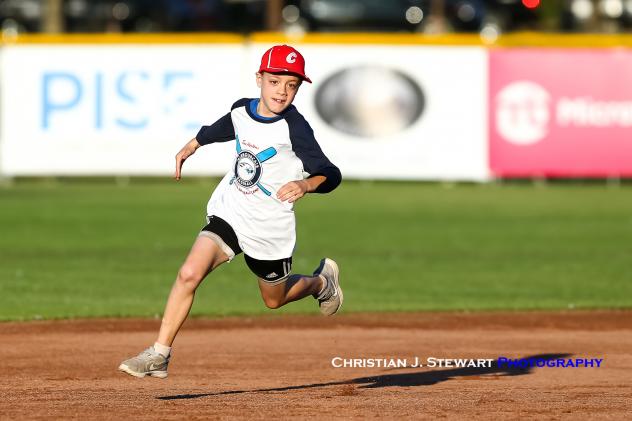 Dexter Bernoties races around the bases during the Victoria HarbourCats mascot race Monday