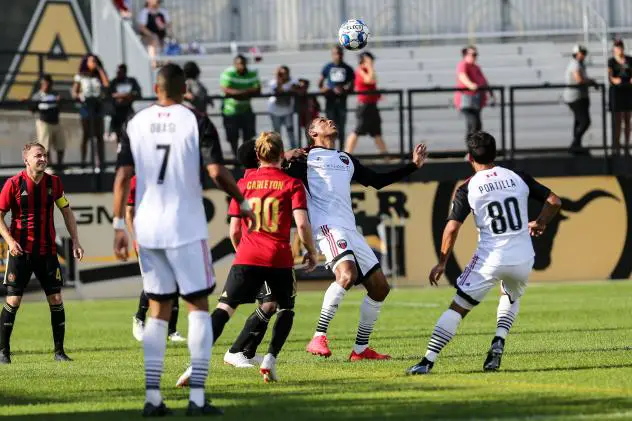 Ottawa Fury FC vies for possession with Atlanta United 2