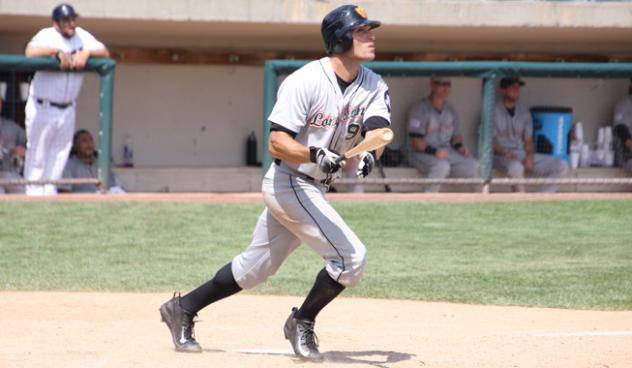 Anthony Vega of the Long Island Ducks watches his home run