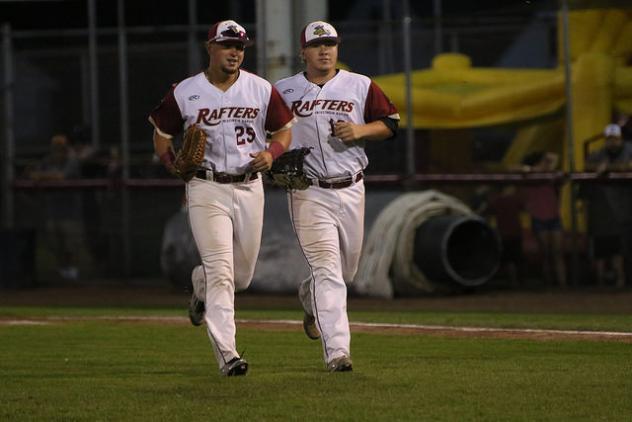 Wisconsin Rapids Rafters run in from the field