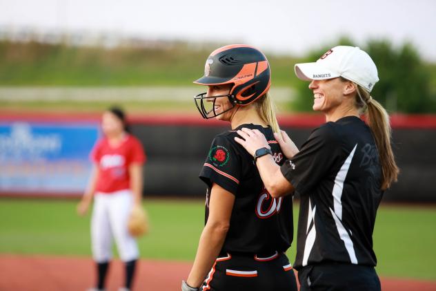 Brenna Moss of the Chicago Bandits receives congratulations on her record-tying hit